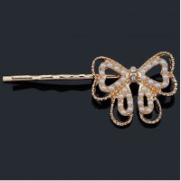 Épingle dorée papillon